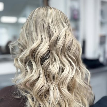 Soft blonde waves styled at Peppes Ladies Salon
